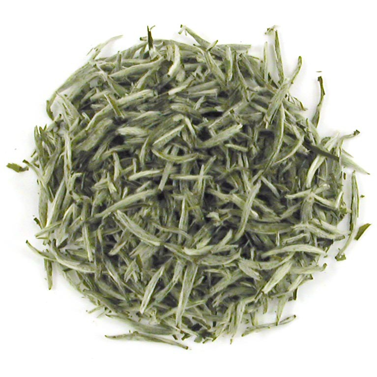 white tea leaves in types and varieties of teas